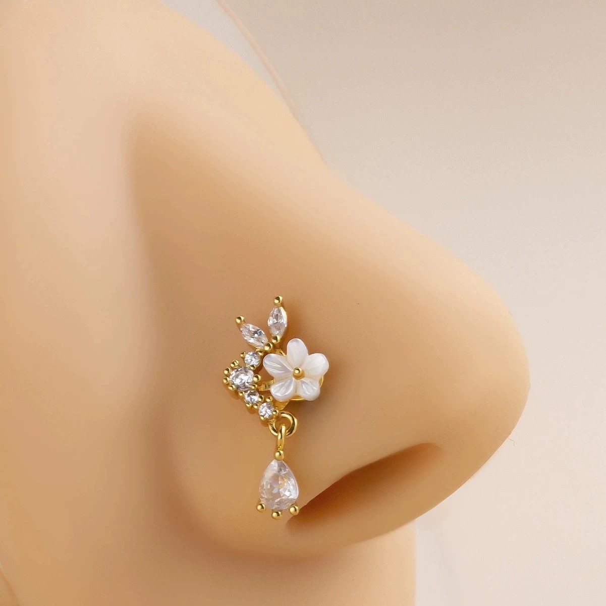 Gold Flower Nose Ring with Dan - Body Jewelry Nose Ring review and price